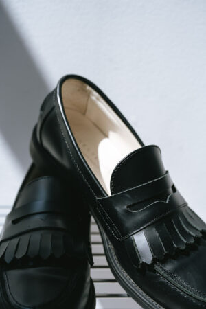 Wilde Black Fringe Penny Loafer